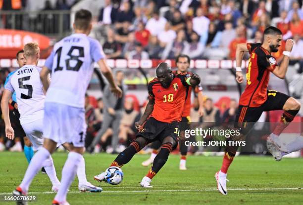 Belgium's forward Romelu Lukaku shoots and scores a goal during the Euro 2024 football tournament group F qualifying match between Belgium and...