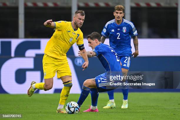 Andriy Yarmolenko of Ukraine, Nicolo Zaniolo of Italy during the EURO Qualifier match between Italy v Ukraine at the San Siro on September 12, 2023...