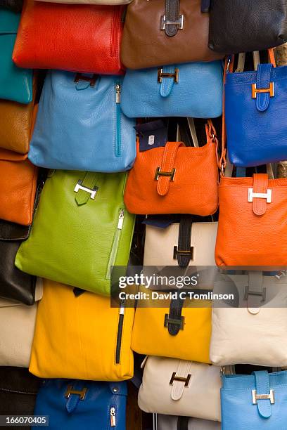 bags for sale, san gimignano, tuscany, italy - handbag collection stock pictures, royalty-free photos & images