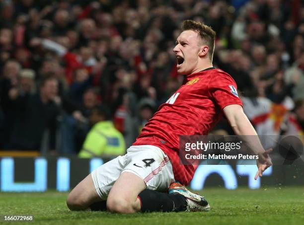 Phil Jones of Manchester United celebrates scoring their first goal during the Barclays Premier League match between Manchester United and Manchester...