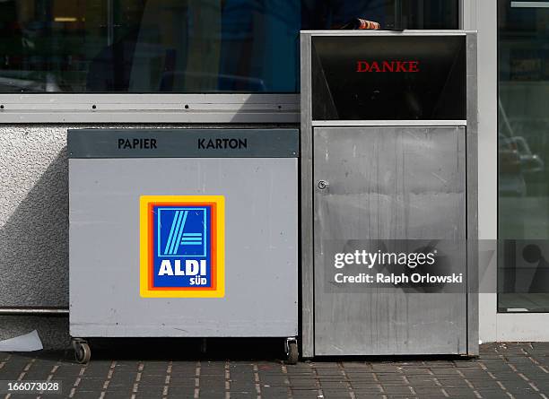 Recycling boxes stand next to the entrance of an Aldi store on April 8, 2013 in Ruesselsheim near Frankfurt, Germany. Aldi, which today is among the...