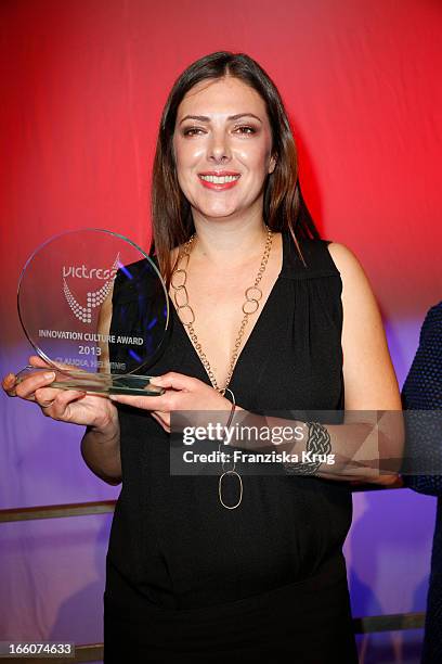 Claudia Helming receives an award at the Victress Day Gala 2013 at the MOA Hotel on April 8, 2013 in Berlin, Germany.