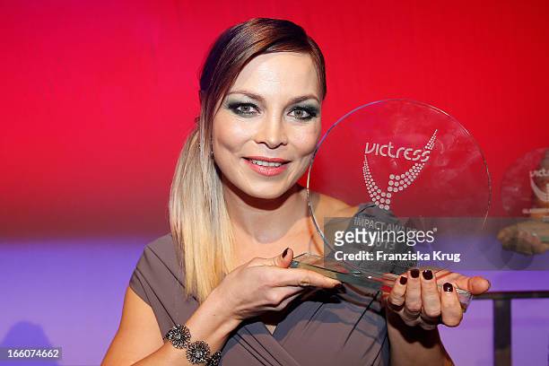 Regina Halmich receives an award at the Victress Day Gala 2013 at the MOA Hotel on April 8, 2013 in Berlin, Germany.