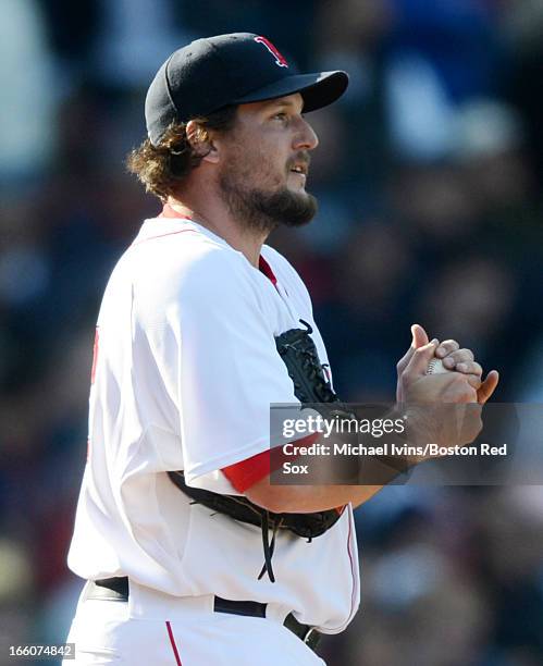 Joel Hanrahan walks back to the mound after giving up a home run to Adam Jones of the Baltimore Orioles in the ninth inning on April 8, 2013 at...