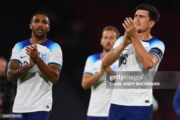 England's striker Callum Wilson , England's striker Harry Kane and England's defender Harry Maguire applauds the fans following during the...