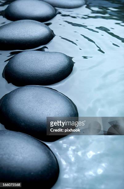 tranquil waters - stepping stones stockfoto's en -beelden