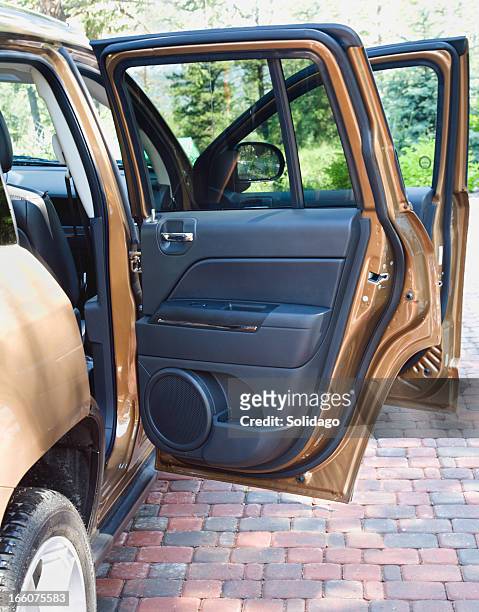 open doors of new suv 4 wheel drive - open car door stock pictures, royalty-free photos & images