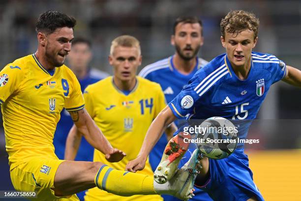 Roman Yaremchuk of Ukraine, Ozan Kabak of Turkey during the EURO Qualifier match between Italy v Ukraine at the San Siro on September 12, 2023 in...