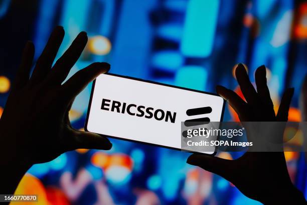 In this photo illustration, the Ericsson logo is displayed on a smartphone screen.