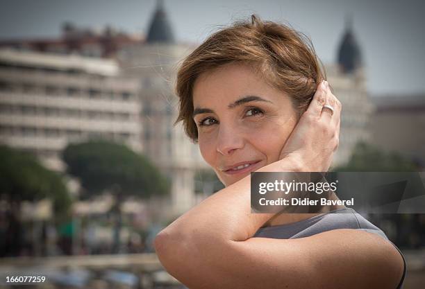 Actress Clotilde Courau poses during a photocall for the tv series'La Source' at MIP TV 2013 on April 8, 2013 in Cannes, France.