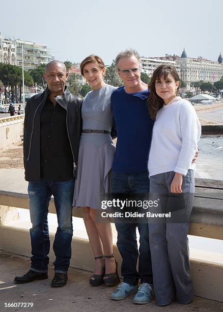 French actors Edouard Montoute, Christophe Lambert, actress Clotilde Courau and actress Flore Bonaventura pose during a photocall for the tv...