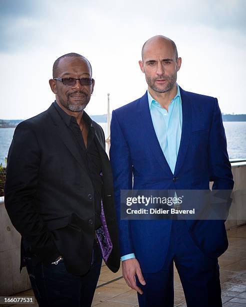 Actors Lennie James and Mark Strong pose during a photocall for the tv series'Low Winter Sun' at MIP TV 2013 on April 8, 2013 in Cannes, France.
