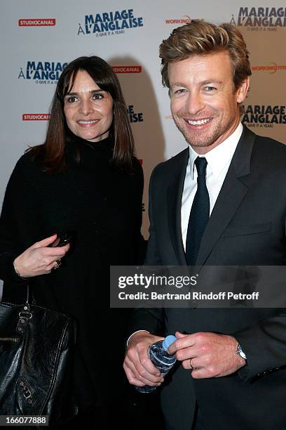 French Public Relation Delphine Olivier with Actor Simon Baker attend 'Mariage A l'Anglaise' Premiere, held at Cinema UGC Normandie on April 8, 2013...