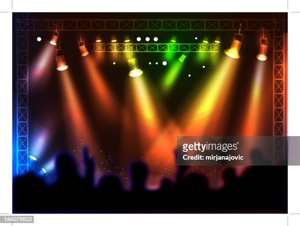 stockillustraties, clipart, cartoons en iconen met colorful spotlights over a silhouette crowd at a concert - staging light
