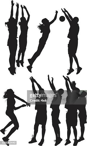 silhouette von menschen spielen volleyball - womens volleyball stock-grafiken, -clipart, -cartoons und -symbole