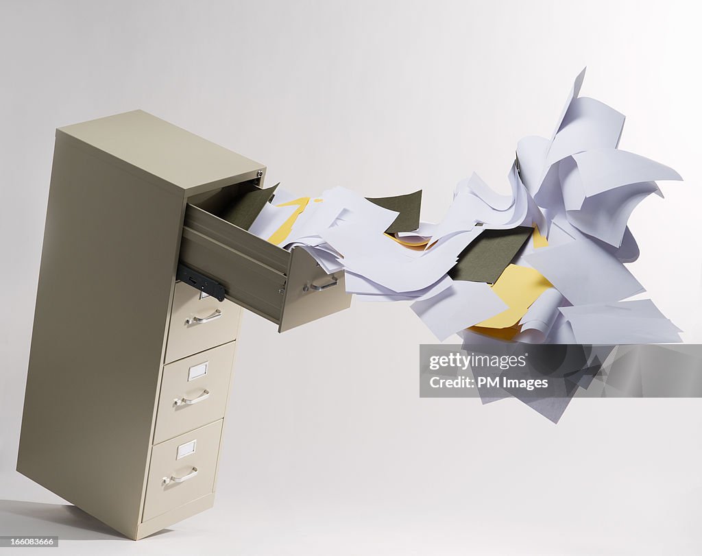 Files flying out of file cabinet