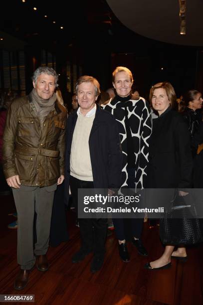 Guests attends the "T: The New York Times Style Magazine" garden party at the Bulgari Hotel on April 8, 2013 in Milan, Italy.