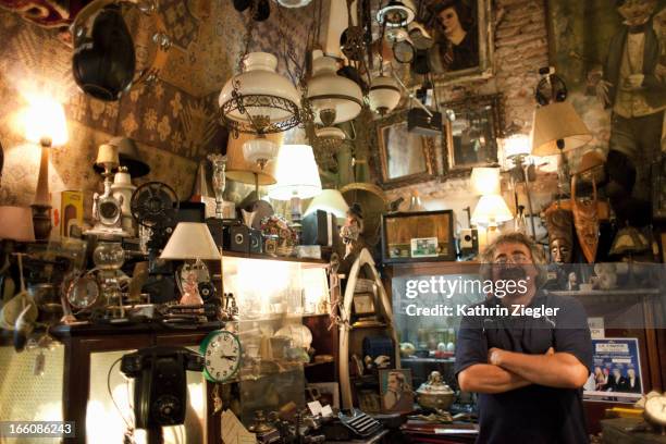 antique store owner in his shop - buenos aires shopping stock pictures, royalty-free photos & images