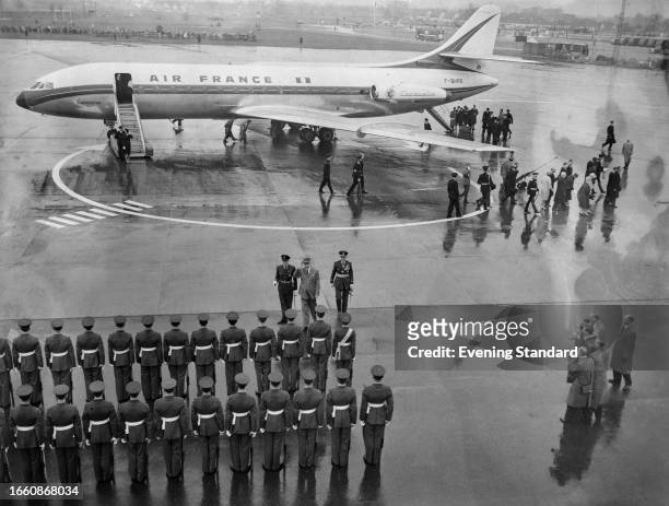 Elevated view of President Charles de Gaulle arriving at Gatwick Airport in Surrey for a state visit to the United Kingdom, April 5th 1960.