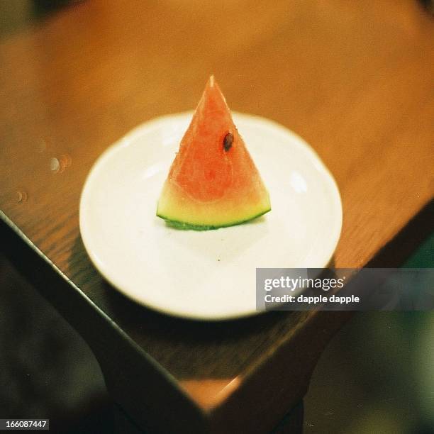 the photograph of the watermelon of the triangle o - square watermelon japan stock pictures, royalty-free photos & images