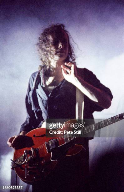 Guitarist Porl Thompson of English rock band The Cure performs on stage at Wembley Arena on July 23rd 1989 in London, United Kingdom.