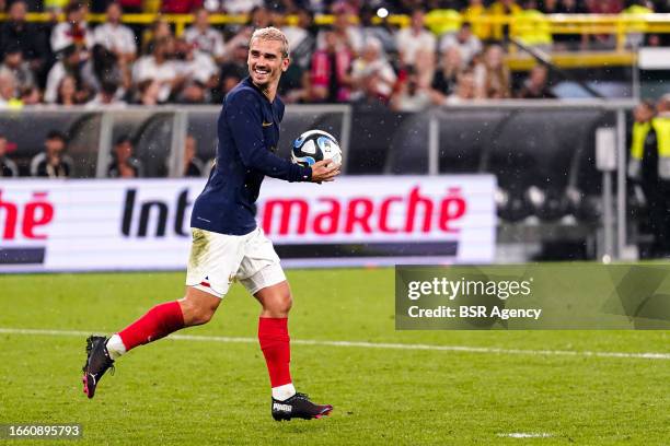 Antoine Griezmann of France celebrates after scoring his teams first goal during the International Friendly match between Germany and France at...