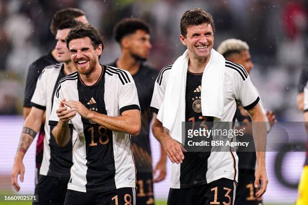 Jonas Hofmann of Germany and Thomas Muller of Germany celebrates his sides win during the International Friendly match between Germany and France at...