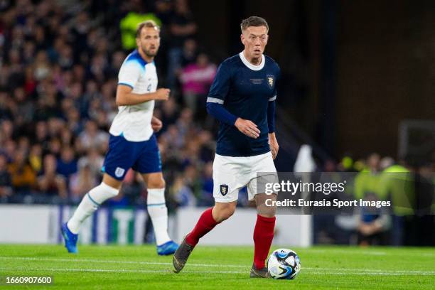 Callum McGregor on the ball during 150th Anniversary Heritage Match between Scotland and England at Hampden Park on September 12, 2023 in Glasgow,...