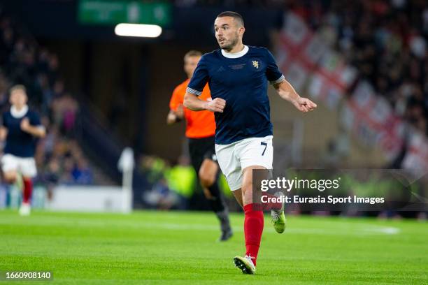 John McGinn in action during 150th Anniversary Heritage Match between Scotland and England at Hampden Park on September 12, 2023 in Glasgow, Scotland.