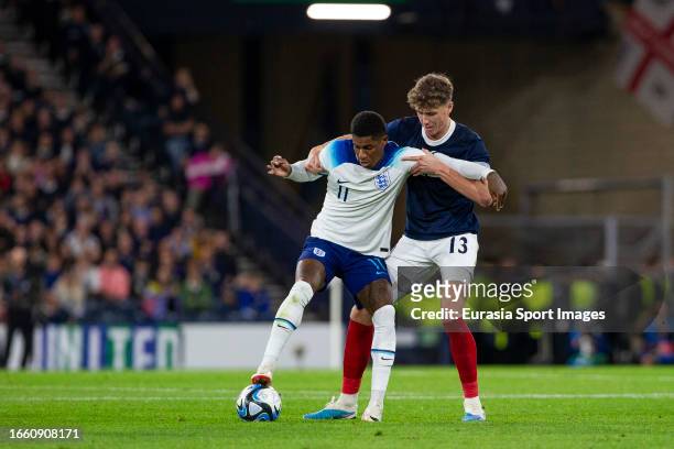 Marcus Rashford and Jack Hendry during 150th Anniversary Heritage Match between Scotland and England at Hampden Park on September 12, 2023 in...