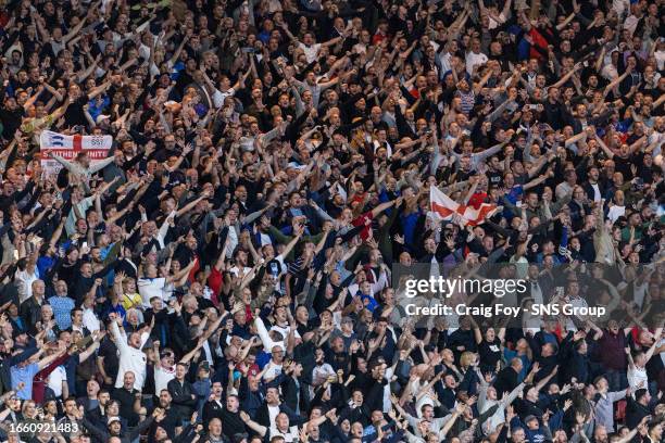 England fans celebrate during the 150th Anniversary Heritage Match between Scotland and England at Hampden Park, on September 12 in Glasgow, Scotland.