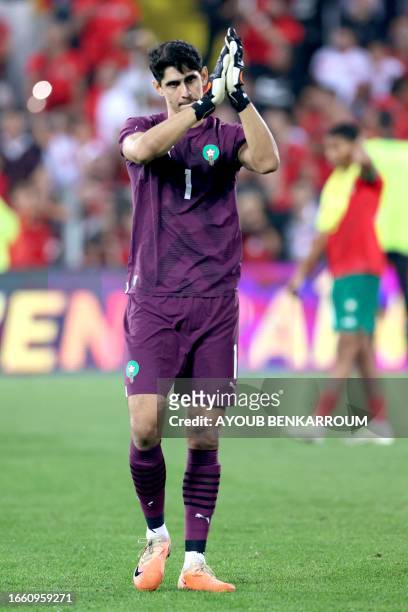 Morocco's goalkeeper Yassine Bounou claps during the international friendly football match between Morocco and Burkina Faso at the Stade...