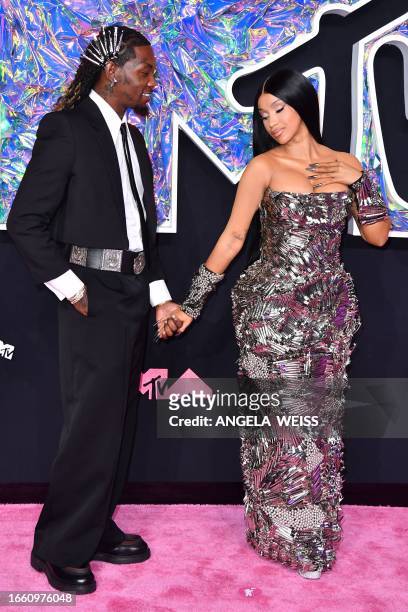 Rapper Cardi B and husband US rapper Offset arrive for the MTV Video Music Awards at the Prudential Center in Newark, New Jersey, on September 12,...