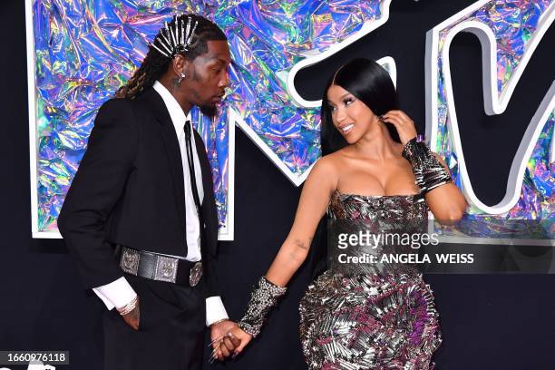 Rapper Cardi B and husband US rapper Offset arrive for the MTV Video Music Awards at the Prudential Center in Newark, New Jersey, on September 12,...
