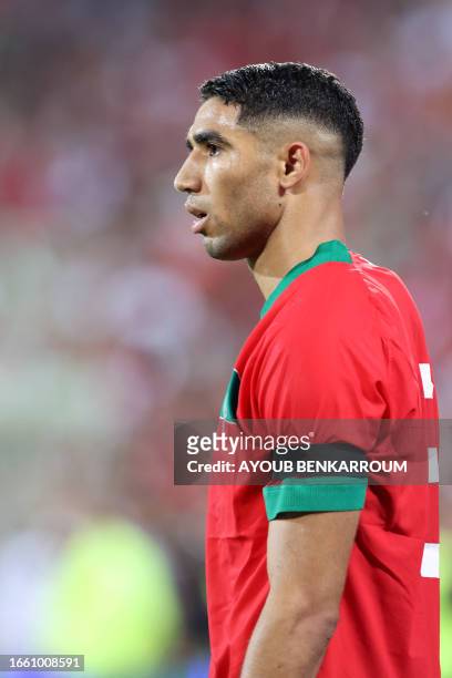Morocco's defender Achraf Hakimi looks on during the international friendly football match between Morocco and Burkina Faso at the Stade...
