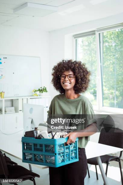 Woman Collecting Electronic Waste In The Office High-Res Stock Photo