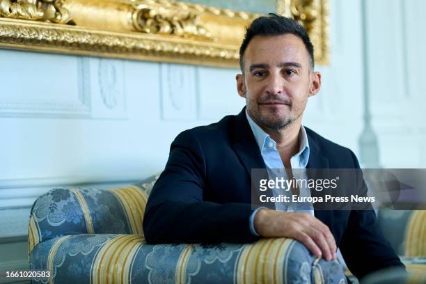 Film director Alejandro Amenabar poses on his arrival at a press conference before receiving the Cinematography Award from the Menendez Pelayo...