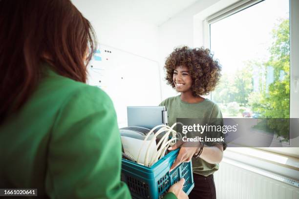 women collecting electronic waste in the office - e waste stock pictures, royalty-free photos & images