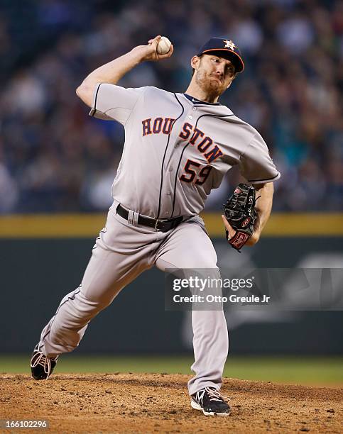 Starting pitcher Philip Humber of the Houston Astros pitches in the second inning against the Seattle Mariners on Opening Day at Safeco Field on...