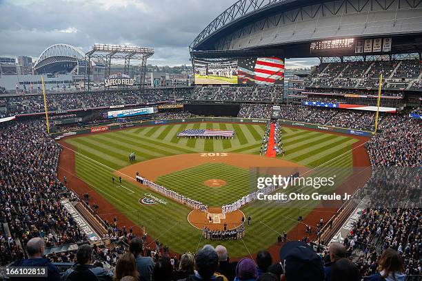 General view during the National Anthem prior to the game between the Seattle Mariners and the Houston Astros on Opening Day at Safeco Field on April...