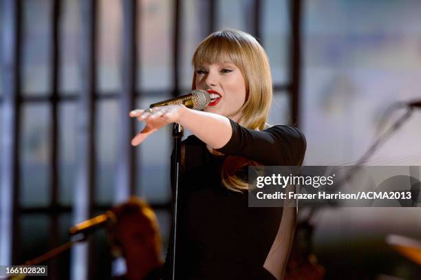 Recording artist Taylor Swift performs onstage during Tim McGraw's Superstar Summer Night presented by the Academy of Country Music at the MGM Grand...