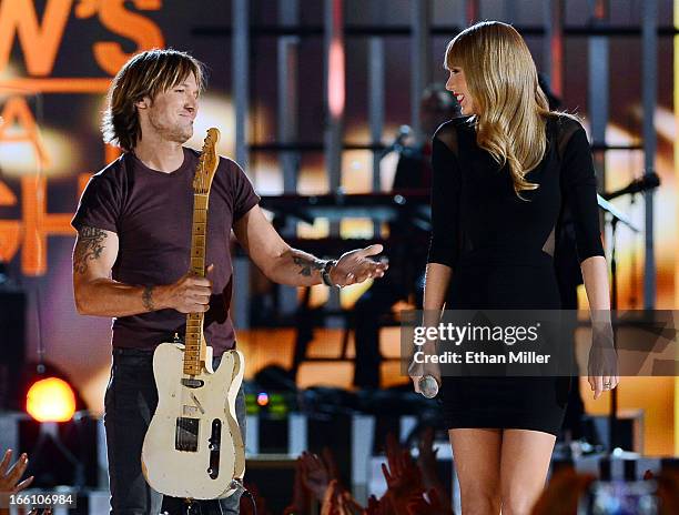 Recording artists Keith Urban and Taylor Swift perform onstage during Tim McGraw's Superstar Summer Night presented by the Academy of Country Music...