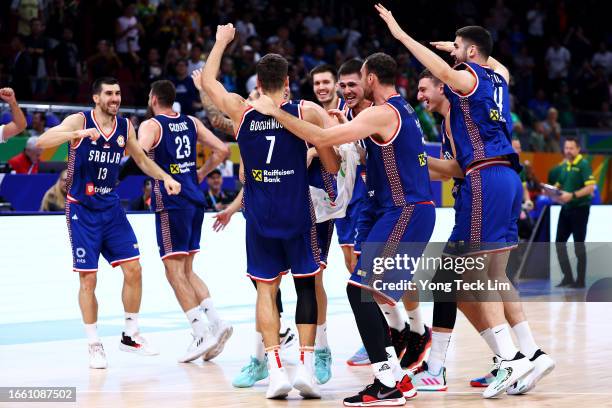Bogdan Bogdanovic of Serbia celebrates with teammates after the FIBA Basketball World Cup quarterfinal victory over Lithuania at Mall of Asia Arena...