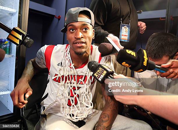 Injured guard Kevin Ware of the Louisville Cardinals is interviewed in the locker room after Louisville won 82-76 against the Michigan Wolverines...