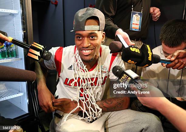 Injured guard Kevin Ware of the Louisville Cardinals is interviewed in the locker room after Louisville won 82-76 against the Michigan Wolverines...