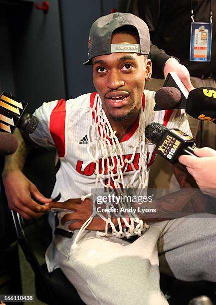 Injured guard Kevin Ware of the Louisville Cardinals is interviewed in the locker room after Louisville won 82-76 against the Michigan Wolverines...