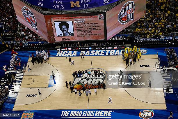 The 2013 Hall of Fame Class inductees stand on the court as the Naismith Memorial Basketball Hall of Fame 2013 Class On Court Announcement is made...