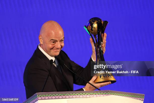 President, Gianni Infantino raises the FIFA Club World Cup trophy during the FIFA Club World Cup Draw at Park Hyatt Jeddah on September 05, 2023 in...
