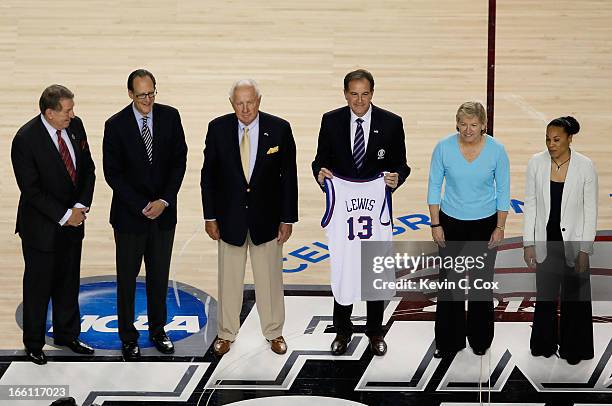 Jerry Colangelo, Russ Granik, Richard Guerin, Jim Nantz , Sylvia Hatchell and Dawn Staley stand on the court as the Naismith Memorial Basketball Hall...