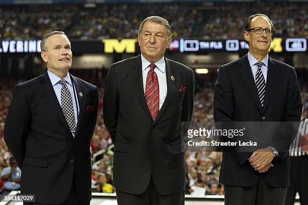 Basketball Hall of Fame President & CEO John Doleva, Jerry Colangelo and Russ Granik stand on the court as the Naismith Memorial Basketball Hall of...